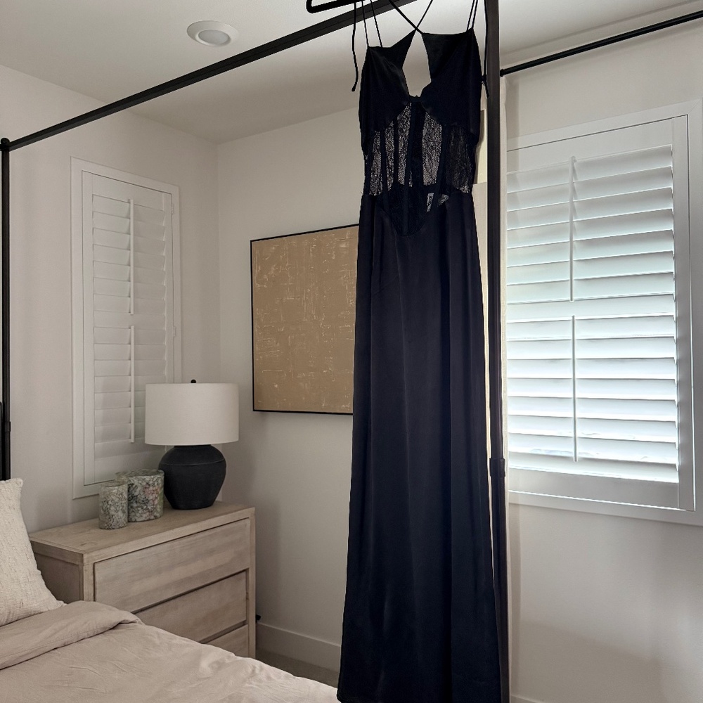 Black satin dress by Sabo